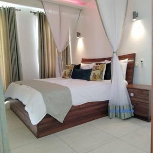 Ένα ή περισσότερα κρεβάτια σε δωμάτιο στο Vipingo budget stay