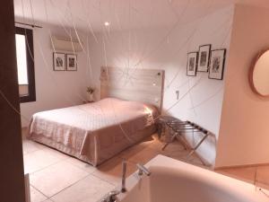 Chambres du Vieux Bistrot客房内的一张或多张床位