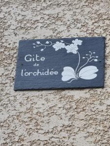 Certifikát, hodnocení, plakát nebo jiný dokument vystavený v ubytování Gîte de l'Orchidée