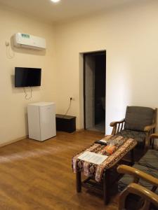 TV a/nebo společenská místnost v ubytování Home inn hotel
