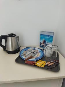 Set per la preparazione di tè e caffè presso Hotel Flisvos