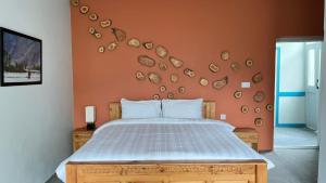 Postel nebo postele na pokoji v ubytování Silk Route Lodge - Hunza