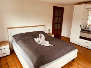 Postel nebo postele na pokoji v ubytování Apartmán Václavská 109