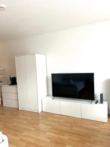 Televisyen dan/atau pusat hiburan di Ferienwohnung in Trossingen