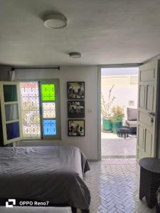 Postel nebo postele na pokoji v ubytování Riad Royal