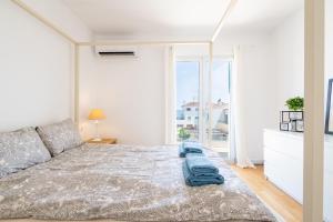 En eller flere senge i et værelse på Casa Olivera De Farrutx + 24 billeder