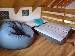 Postel nebo postele na pokoji v ubytování Apartmány Máchovo jezero
