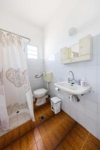 Koupelna v ubytování Nikos Rooms