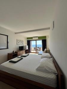 Postel nebo postele na pokoji v ubytování Hotel Ana Murter