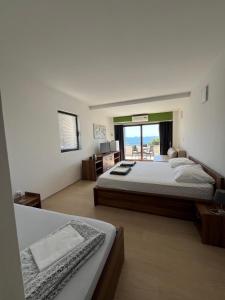Postel nebo postele na pokoji v ubytování Hotel Ana Murter + 37 fotografií