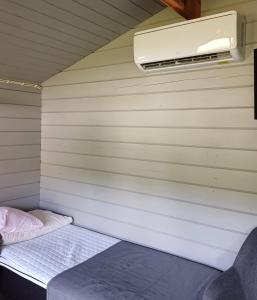 Postel nebo postele na pokoji v ubytování Lapinkylä