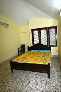 Postel nebo postele na pokoji v ubytování Bhaksaran Home Stay