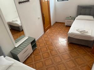 Postel nebo postele na pokoji v ubytování Hotel Ani