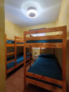 Postel nebo postele na pokoji v ubytování Apartamento OsMa