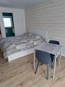 Postel nebo postele na pokoji v ubytování L'école buissonnière