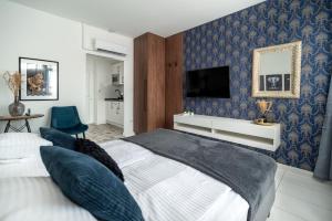 Postel nebo postele na pokoji v ubytování Geri Mini Home