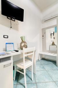 TV a/nebo společenská místnost v ubytování B&B Casa 28