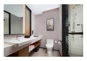 Koupelna v ubytování 南宁兴宁希尔顿欢朋酒店 Hampton by Hilton Nanning Xingning