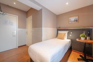 Katil atau katil-katil dalam bilik di Hotel Barry