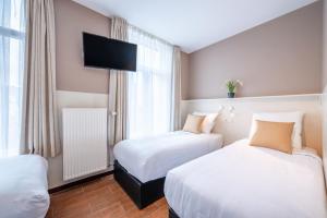 Katil atau katil-katil dalam bilik di Hotel Barry