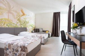 Postel nebo postele na pokoji v ubytování SH Dolce Mare- All inclusive- Free Beach & Beach Bar