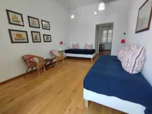Postel nebo postele na pokoji v ubytování Locanda Mari