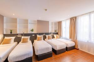 Katil atau katil-katil dalam bilik di Hotel Barry