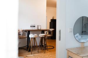 Kuchyň nebo kuchyňský kout v ubytování JUNIK Apartments - Deine Cityapartments in Duisburg + 27 fotografií