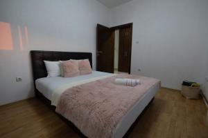 Postel nebo postele na pokoji v ubytování Green Art House + 24 fotografií
