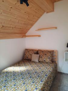 Postel nebo postele na pokoji v ubytování Hiša Ella