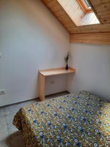 Postel nebo postele na pokoji v ubytování Hiša Ella