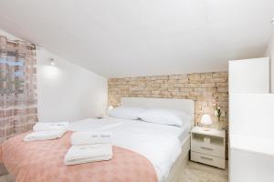 Ένα ή περισσότερα κρεβάτια σε δωμάτιο στο Villa Depicolo +42 φωτογραφίες