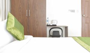Treebo Sandpipers Kushalnagar客房内的一张或多张床位