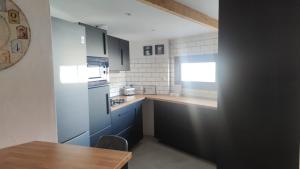 Kuchyň nebo kuchyňský kout v ubytování YucaJaus