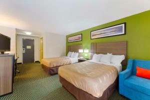 Postel nebo postele na pokoji v ubytování Quality Inn near Cedar Point - Huron, Sandusky OH
