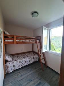 Postel nebo postele na pokoji v ubytování Piccolo Paradiso