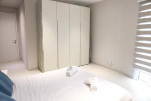 Vuode tai vuoteita majoituspaikassa Gorgeous 2BR Gozo Apt with private balcony & Pool by 360 Estates