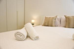 Vuode tai vuoteita majoituspaikassa Gorgeous 2BR Gozo Apt with private balcony & Pool by 360 Estates