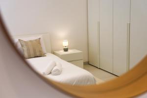 Vuode tai vuoteita majoituspaikassa Gorgeous 2BR Gozo Apt with private balcony & Pool by 360 Estates