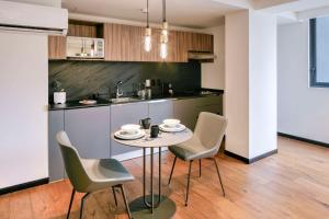 Kuchyň nebo kuchyňský kout v ubytování Amberes 64, Ascend Hotel Collection