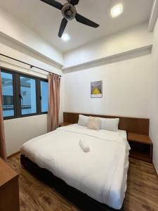 Katil atau katil-katil dalam bilik di Delisha Homestay 3R2B The Retreat,Aranda Nova