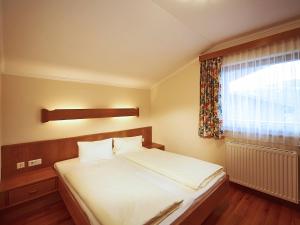 Posteľ alebo postele v izbe v ubytovaní Apartment Sonnberg-1 by Interhome