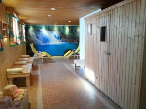 Televízia a/alebo spoločenská miestnosť v ubytovaní Apartment Sonnberg-1 by Interhome