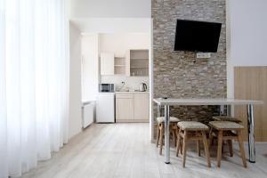 Η κουζίνα ή μικρή κουζίνα στο Deluxe Apartments D 25