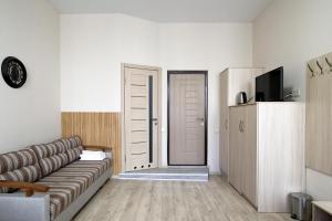 Μια τηλεόραση ή/και κέντρο ψυχαγωγίας στο Deluxe Apartments D 25