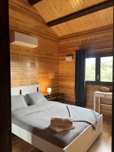 Ένα ή περισσότερα κρεβάτια σε δωμάτιο στο Casa en Port del Comte mínimo 31 días