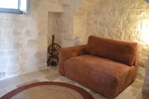 Posezení v ubytování B&B Fuga al Trullo