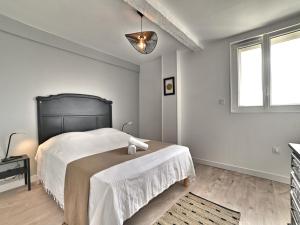 Ένα ή περισσότερα κρεβάτια σε δωμάτιο στο Holiday Home La Picotelle by Interhome