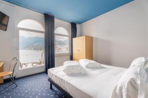 Katil atau katil-katil dalam bilik di Lake Hotel Ifigenia