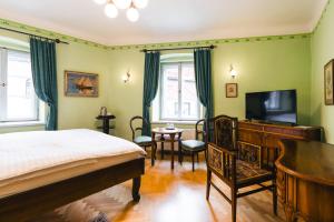 En TV eller et underholdningssystem på Hotel Leonardo